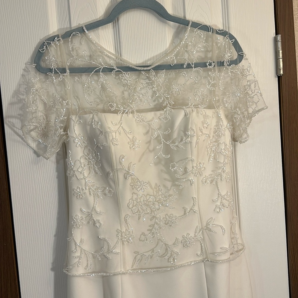 Michelangelo wedding dress size 6. Beaded. Slit skirt.